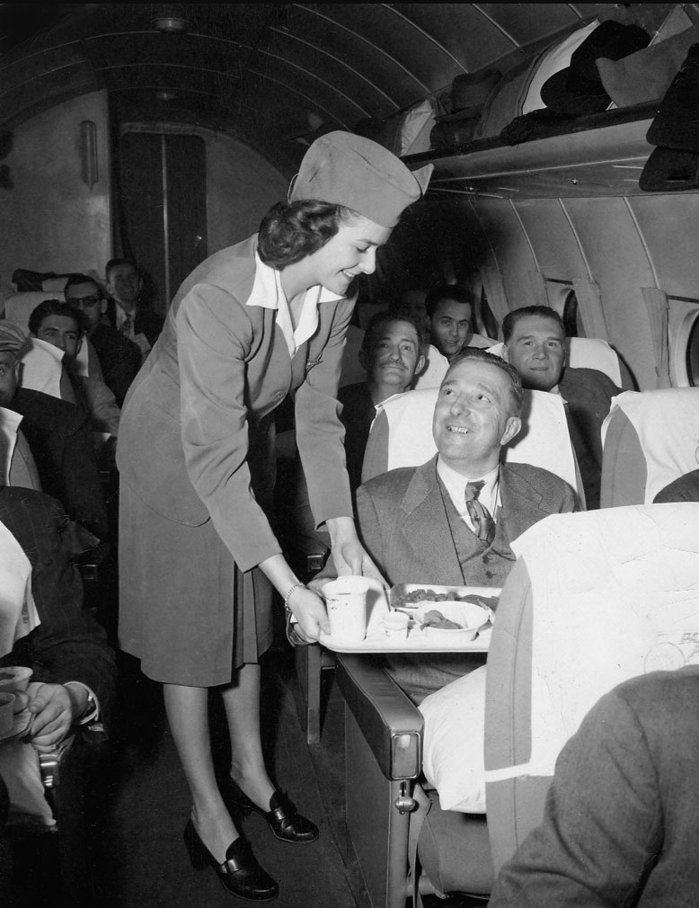 Pan Ams Alice Lemieux serving passengers June 1947 Around The World